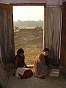 061119 0707_Mandir NiluDee & OkainuChak reading.JPG