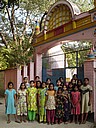 061205 1438_Agrasara Mandir gate girls good-bye.JPG